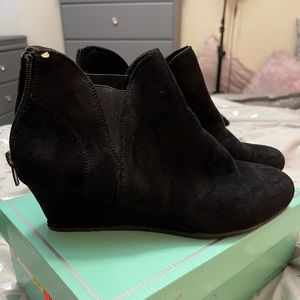 Women’s black wedge booties